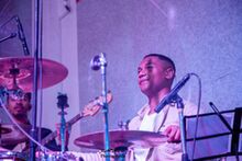 Emmanuel on drums